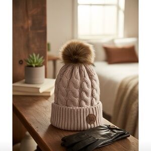 Cozy Taupe Knit Pom-Pom Beanie made with upcycled authentic Gucci button